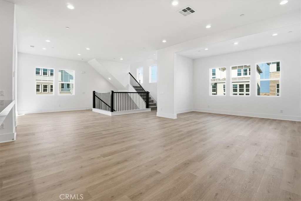 8 Remy Lane Montebello, CA 90640 - Photo 24 of 61 a view of an empty room with a window and wooden floor
