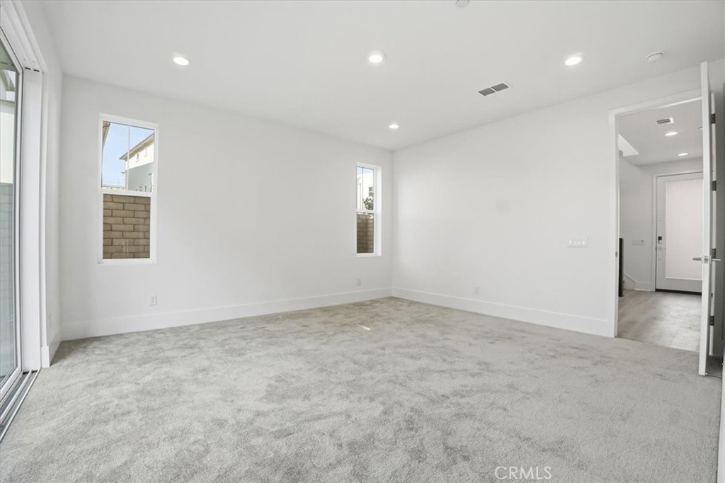 8 Remy Lane Montebello, CA 90640 - Photo 33 of 61 an empty room with windows and closet