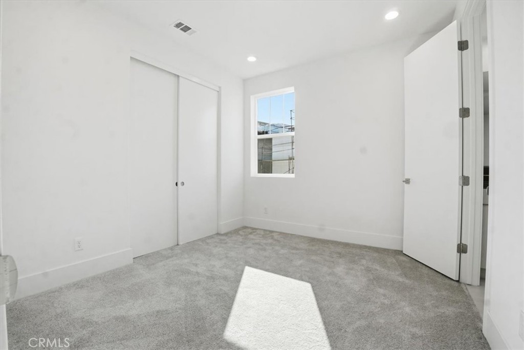 8 Remy Lane Montebello, CA 90640 - Photo 39 of 61 a view of an empty room with closet and a window