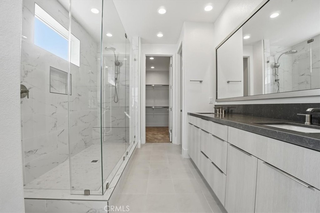 8 Remy Lane Montebello, CA 90640 - Photo 47 of 61 a spacious bathroom with a shower and a sink