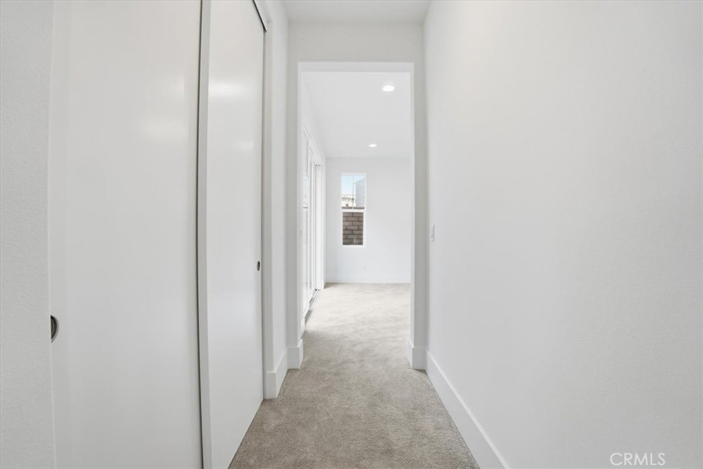 8 Remy Lane Montebello, CA 90640 - Photo 57 of 61 a view of a hallway with wooden floor
