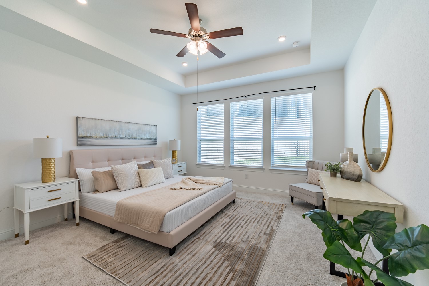 1040 Villa Rialto View Leander, TX 78641 - Photo 20 of 24 Recessed lighting illuminates this inviting bedroom featuring a ceiling fan, plush carpeting, and abundant natural light.
