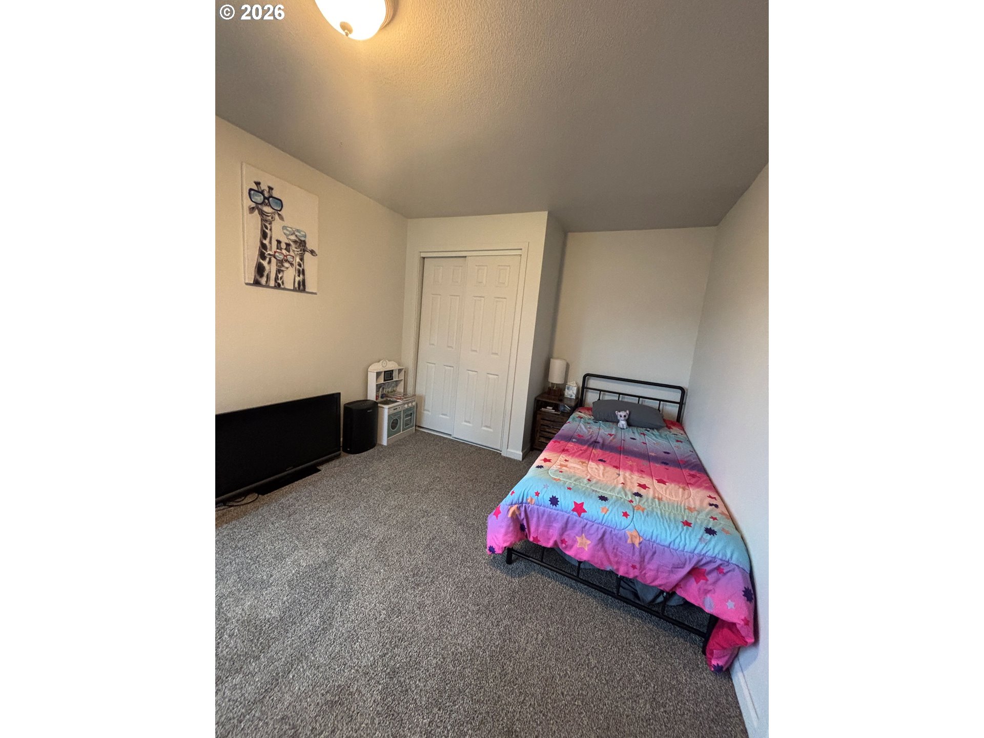 337 Cypress Street Longview, WA 98632 - Photo 12 of 16 a bedroom with bed and a window
