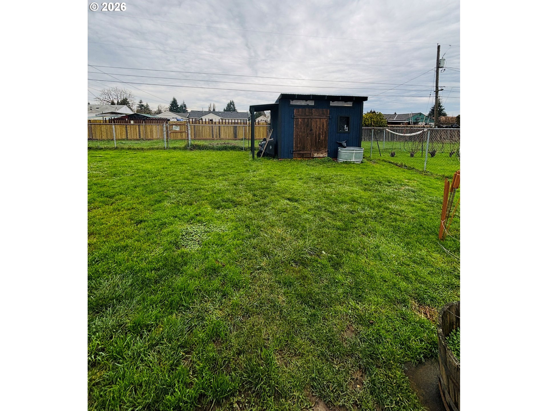 337 Cypress Street Longview, WA 98632 - Photo 15 of 16 a view of a house with a yard