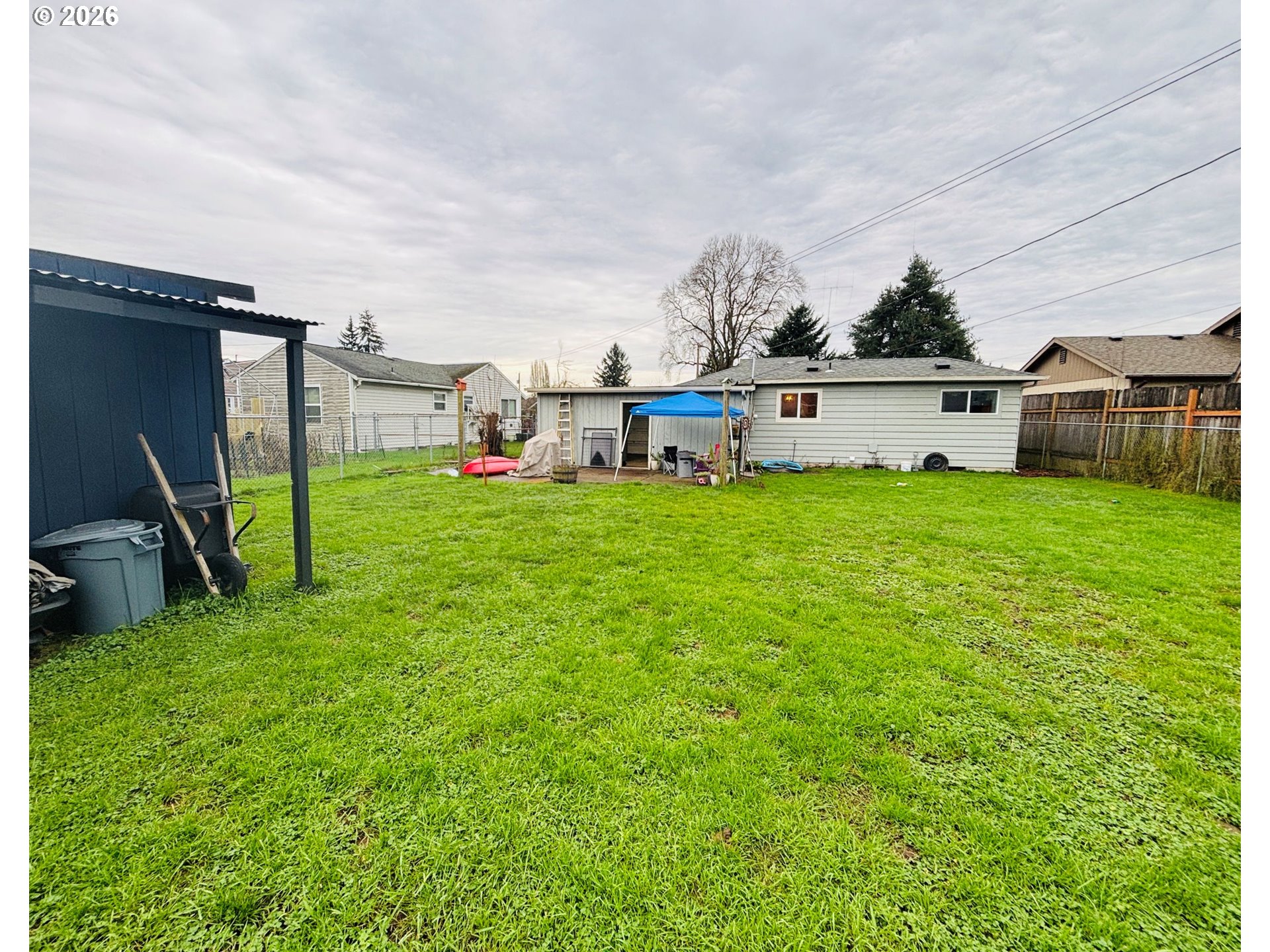 337 Cypress Street Longview, WA 98632 - Photo 16 of 16 a view of a house with a yard and deck