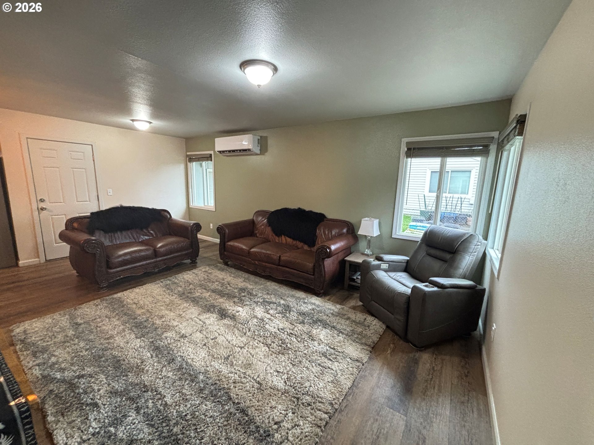 337 Cypress Street Longview, WA 98632 - Photo 3 of 16 a living room with furniture a couch and a dresser
