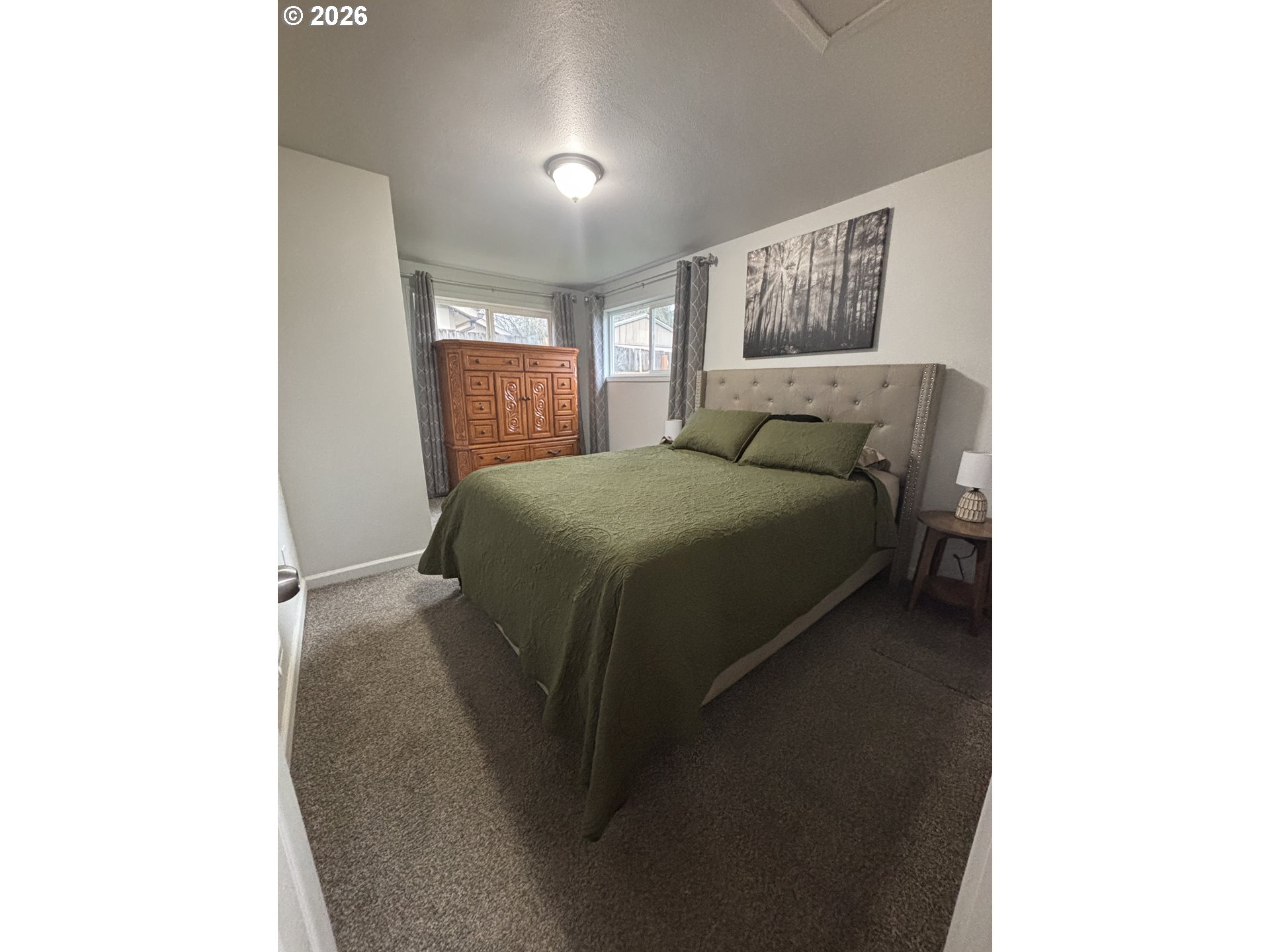 337 Cypress Street Longview, WA 98632 - Photo 9 of 16 a bedroom with a bed and window