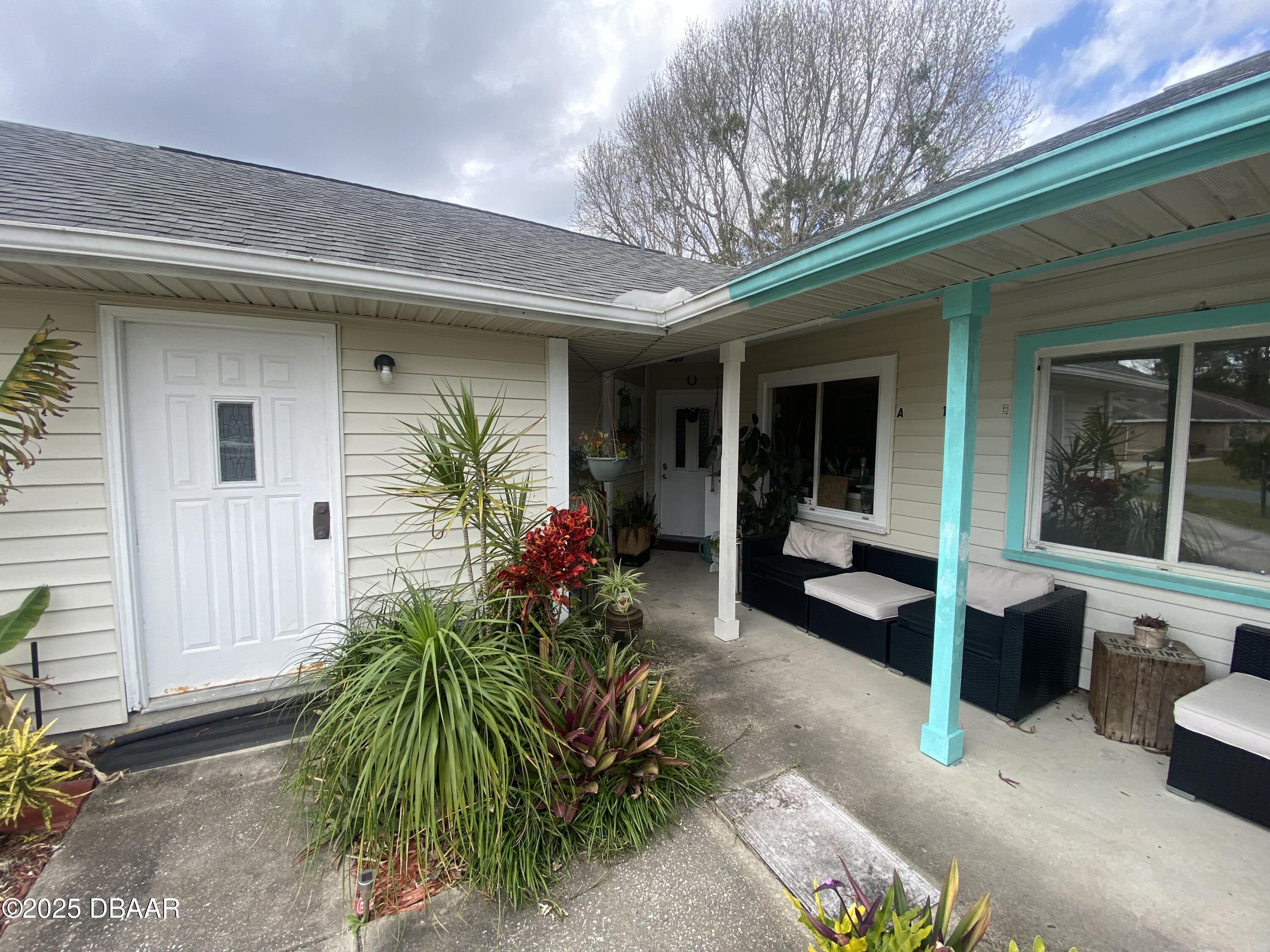 1 Plumtree Place, Unit A Palm Coast, FL 32164 - Photo 3 of 37 Front