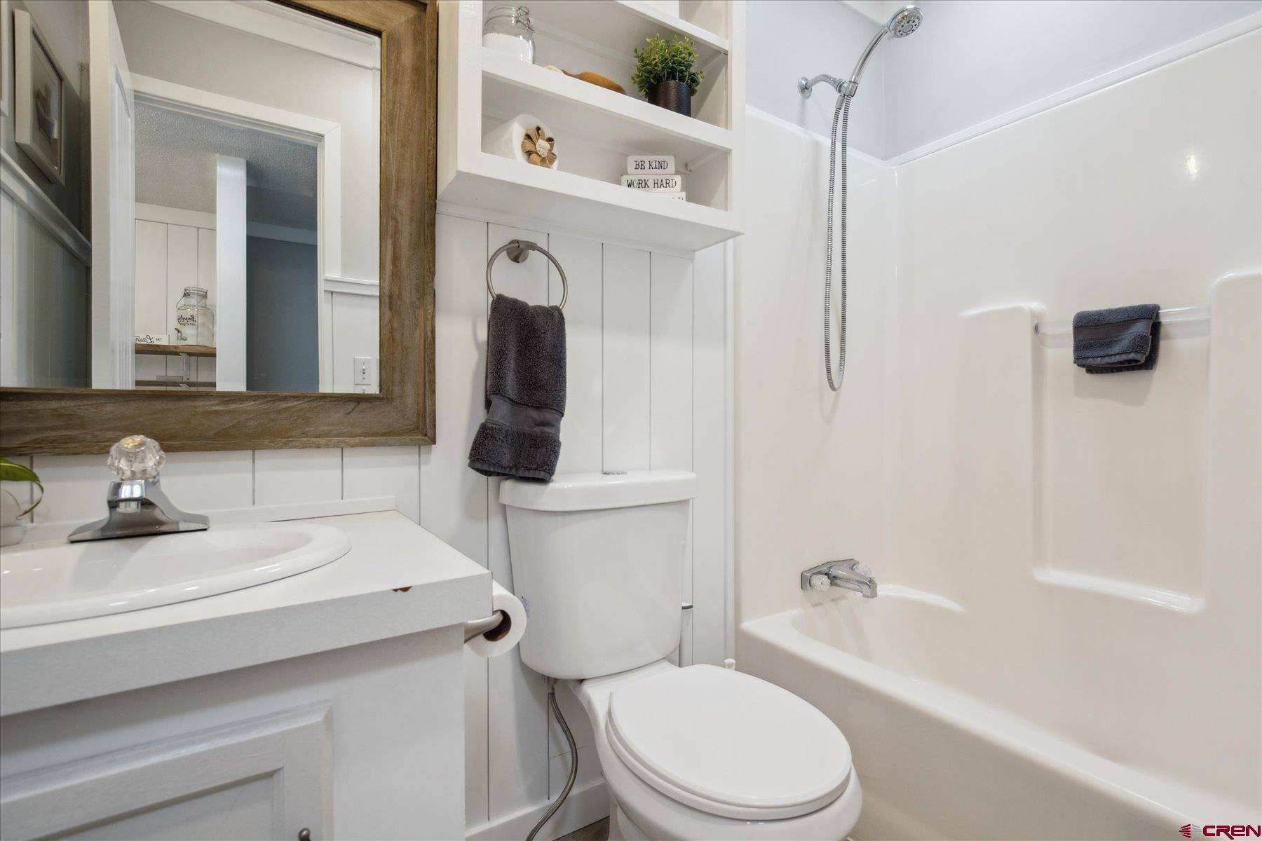 31886 Rd L Mancos, CO 81328 - Photo 21 of 41 a bathroom with a sink a toilet and shower