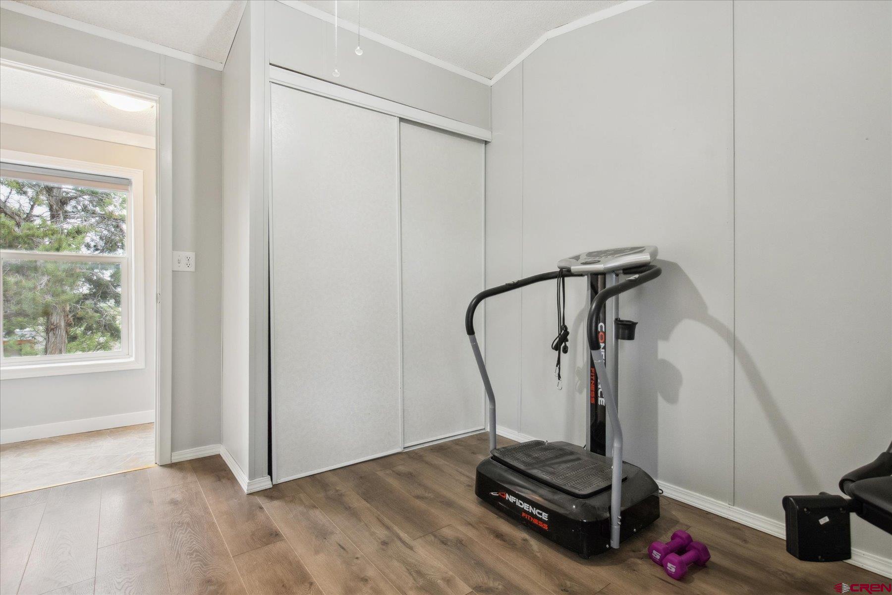 31886 Rd L Mancos, CO 81328 - Photo 24 of 41 a room with gym equipment