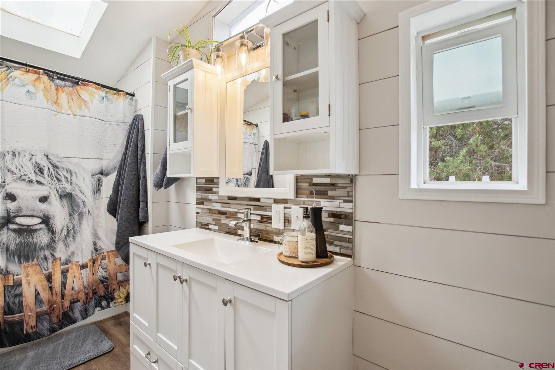 31886 Rd L Mancos, CO 81328 - Photo 26 of 41 a kitchen with a sink cabinets and a window