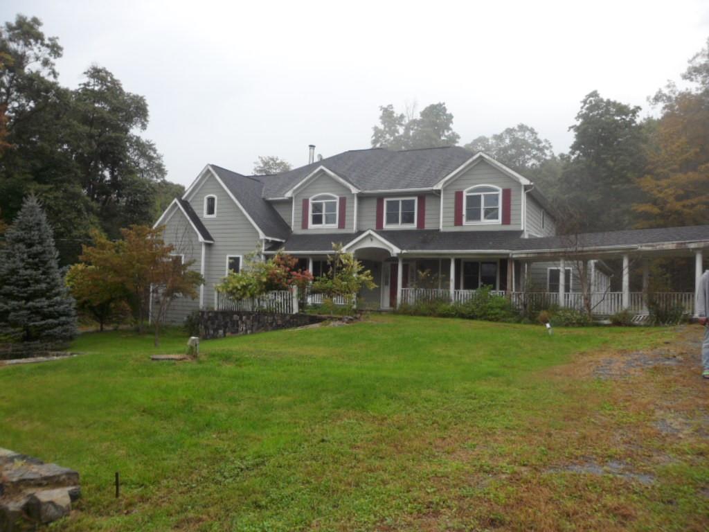 320 Hortontown Road Hopewell Junction, NY 12533 - Photo 1 of 1 a front view of a house with a garden