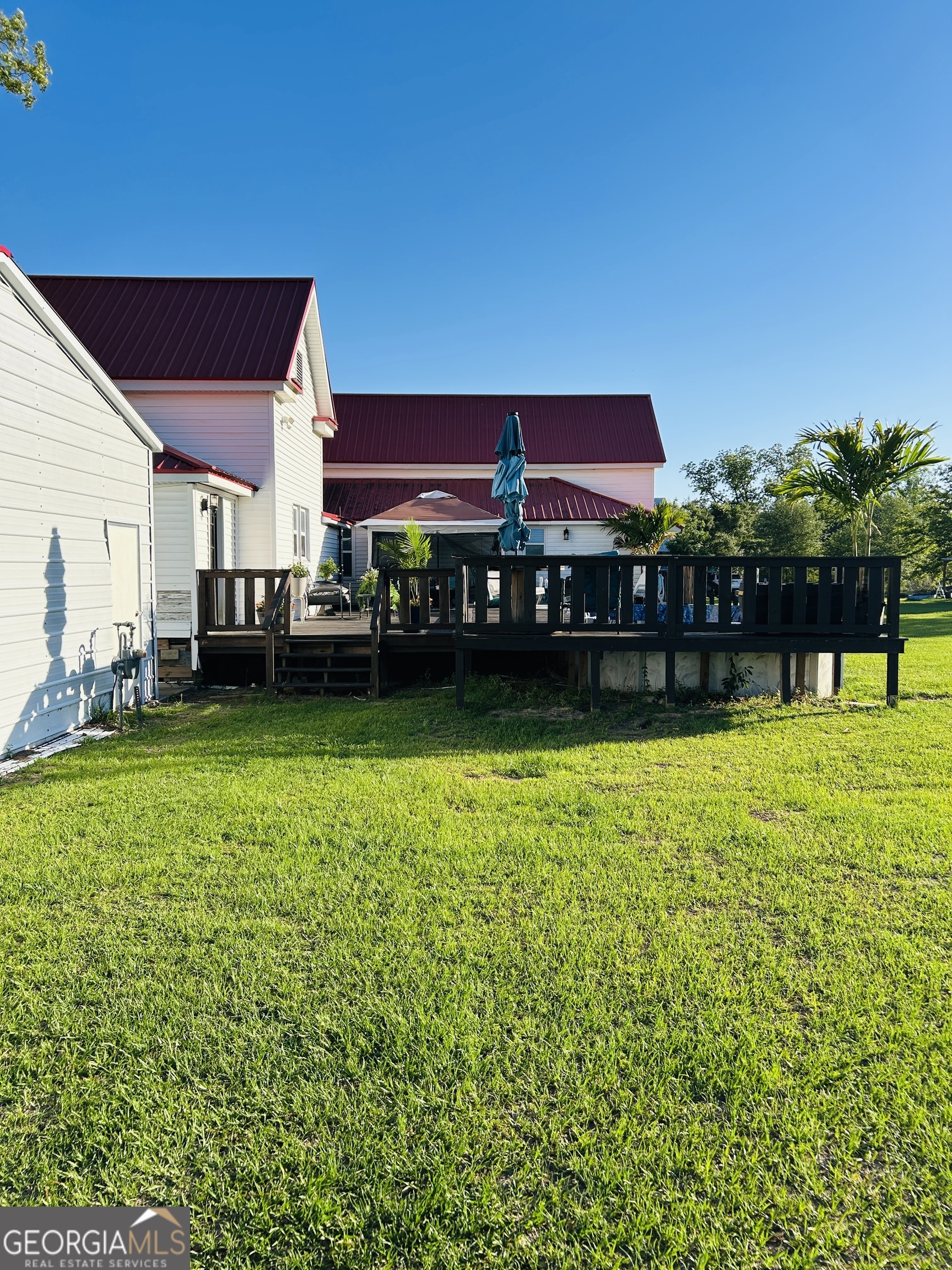 5065 10 Mile Road Baxley, GA 31513 - Photo 54 of 70 a view of a house with a yard