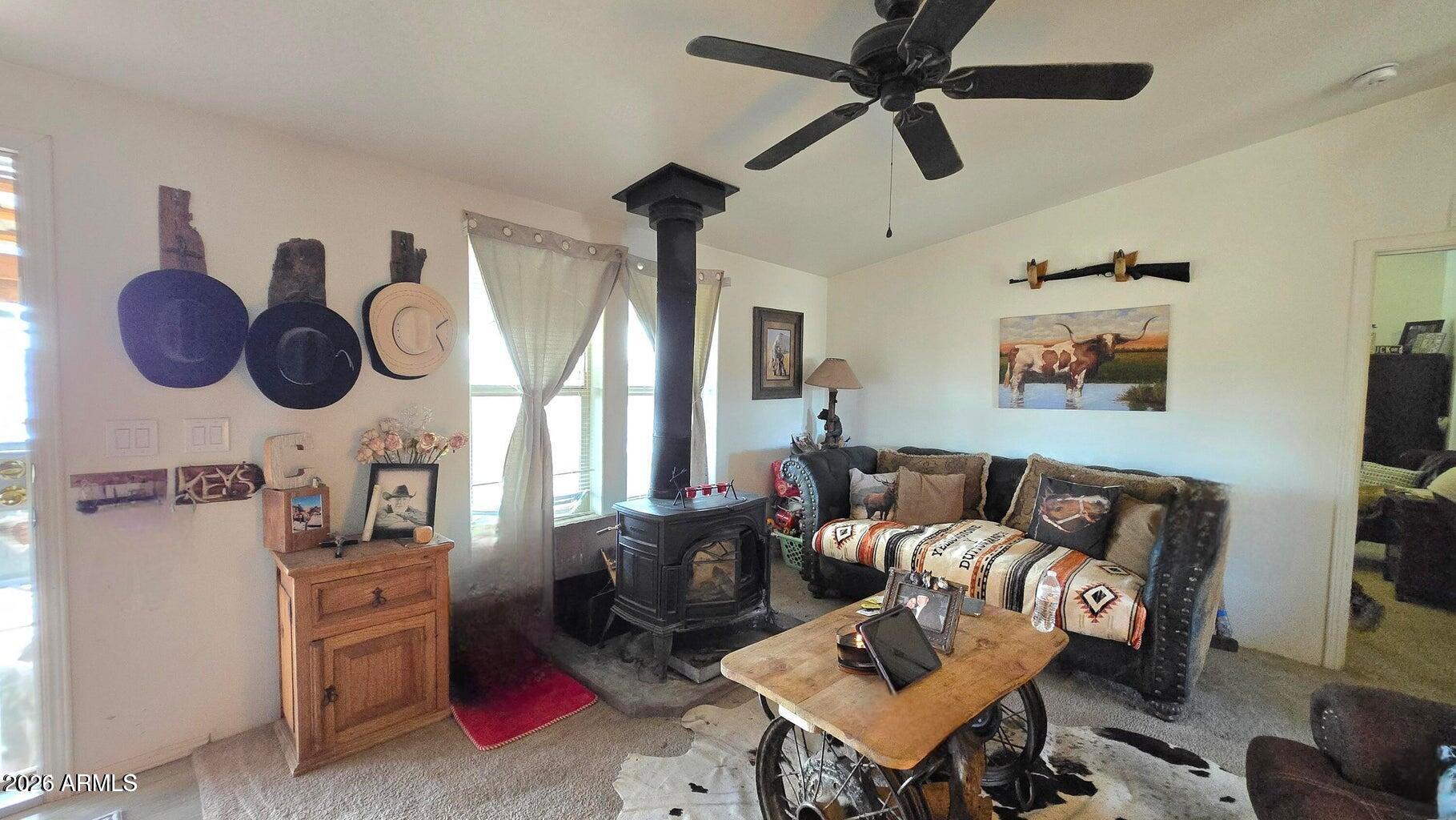 8495 Antelope Run Road Ash Fork, AZ 86320 - Photo 14 of 40 a living room with furniture and a window