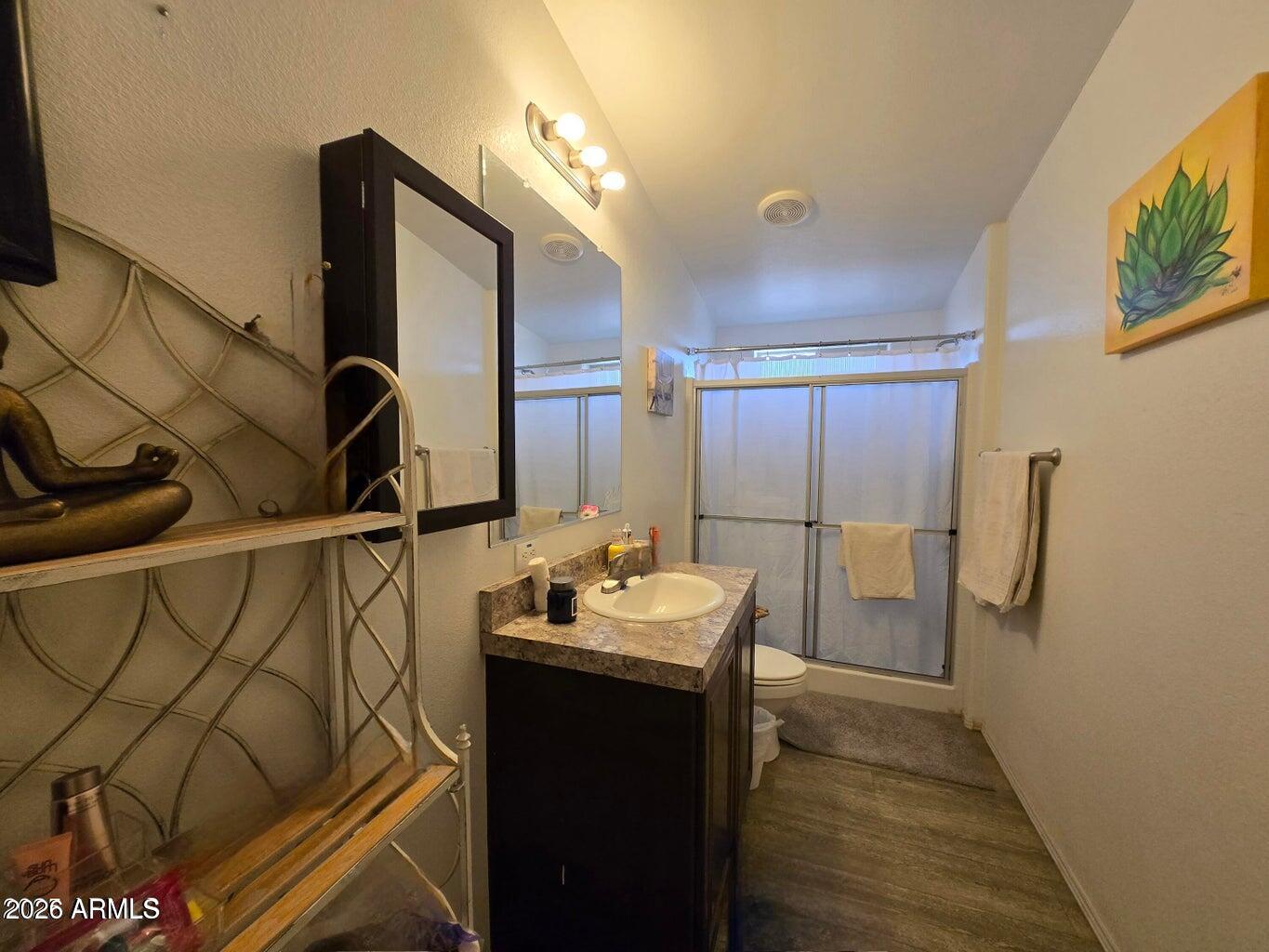 8495 Antelope Run Road Ash Fork, AZ 86320 - Photo 21 of 40 a bathroom with a sink and mirror
