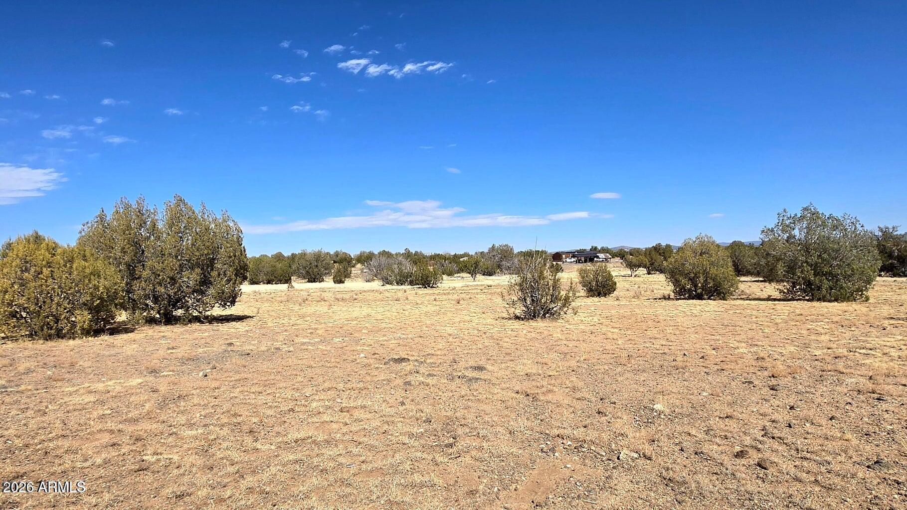 8495 Antelope Run Road Ash Fork, AZ 86320 - Photo 31 of 40 a view of a road with a building in the background