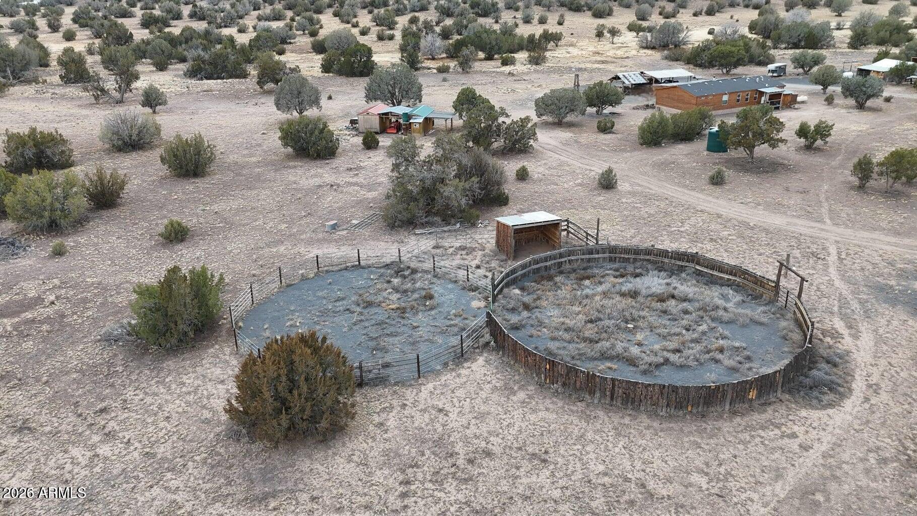 8495 Antelope Run Road Ash Fork, AZ 86320 - Photo 38 of 40 an aerial view of a house with a yard