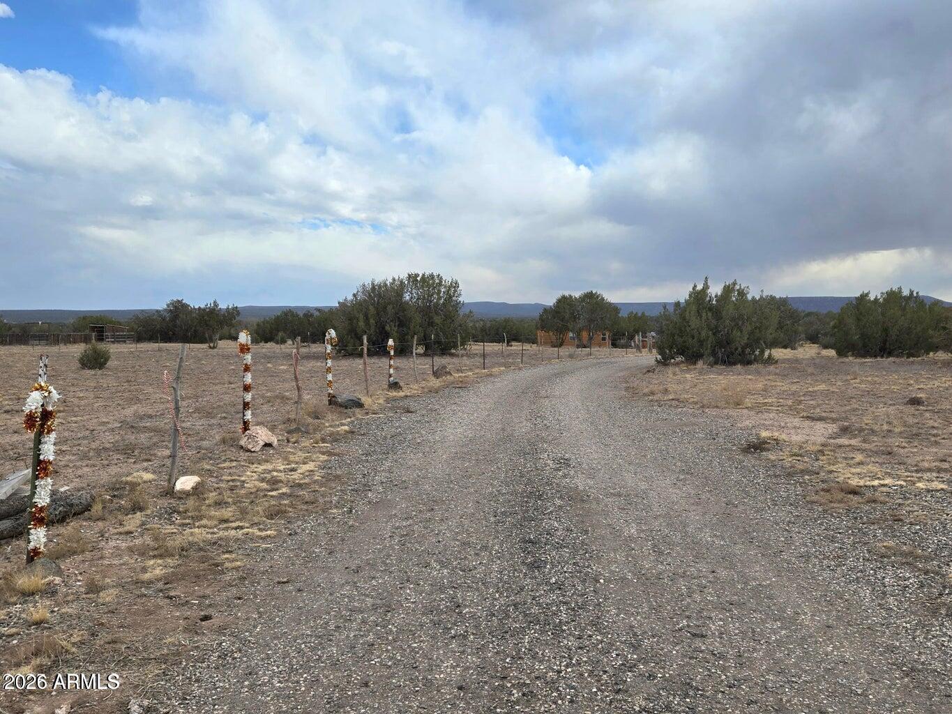 8495 Antelope Run Road Ash Fork, AZ 86320 - Photo 10 of 40 a view of a lake view with houses in back