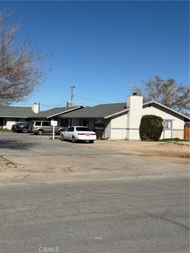 20958 Nisqually Road Apple Valley, CA 92308 - Photo 1 of 11 a car parked on the side of the road