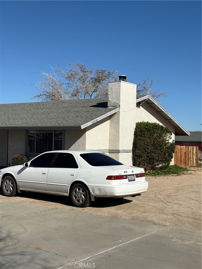 20958 Nisqually Road Apple Valley, CA 92308 - Photo 11 of 11 a view of a car parked in front of a building