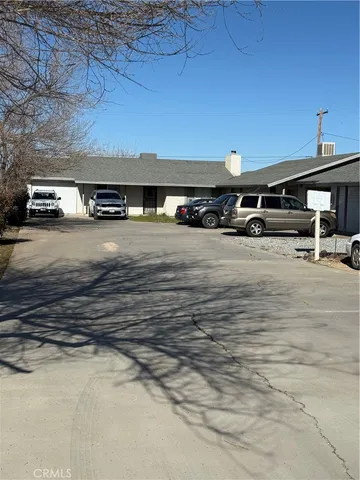 a view of a car park with an outdoor space