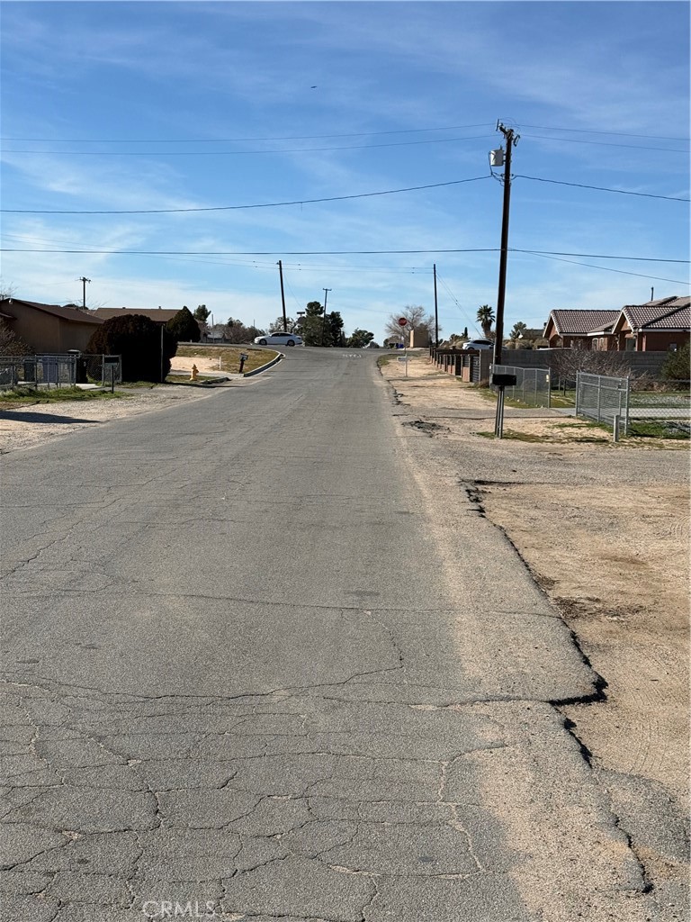 20958 Nisqually Road Apple Valley, CA 92308 - Photo 9 of 11 a view of a terrace with sky view