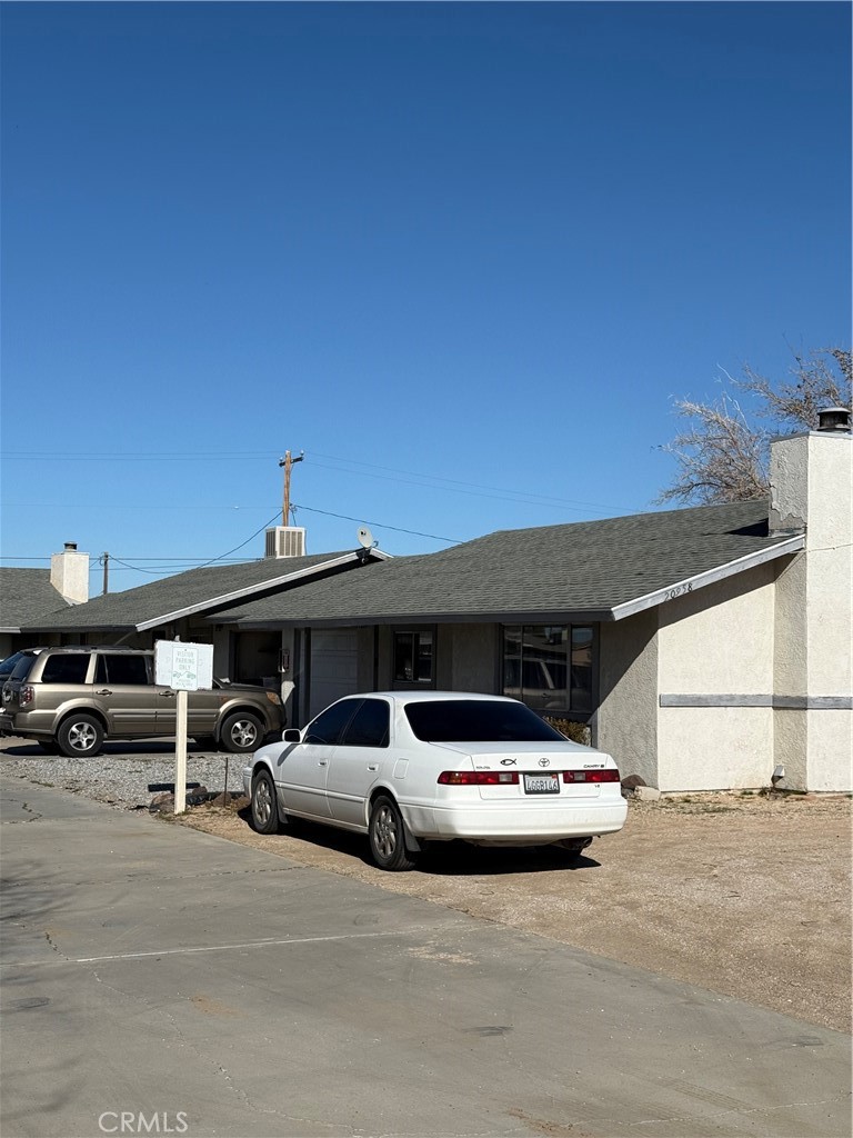 20958 Nisqually Road Apple Valley, CA 92308 - Photo 10 of 11 a car parked in front of a building
