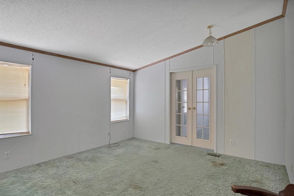 318 Bavarian Road Waco, TX 76705 - Photo 13 of 26 an empty room with windows