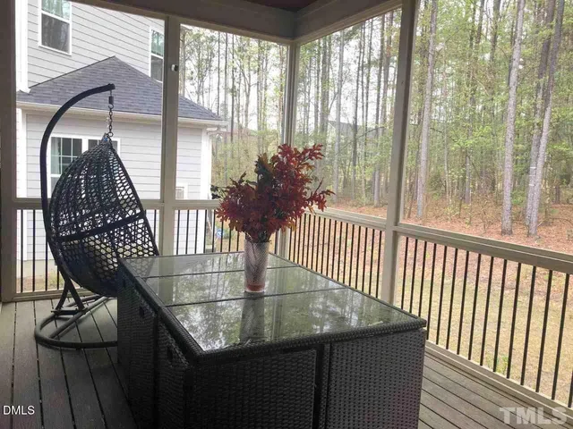 a view of a balcony dining area