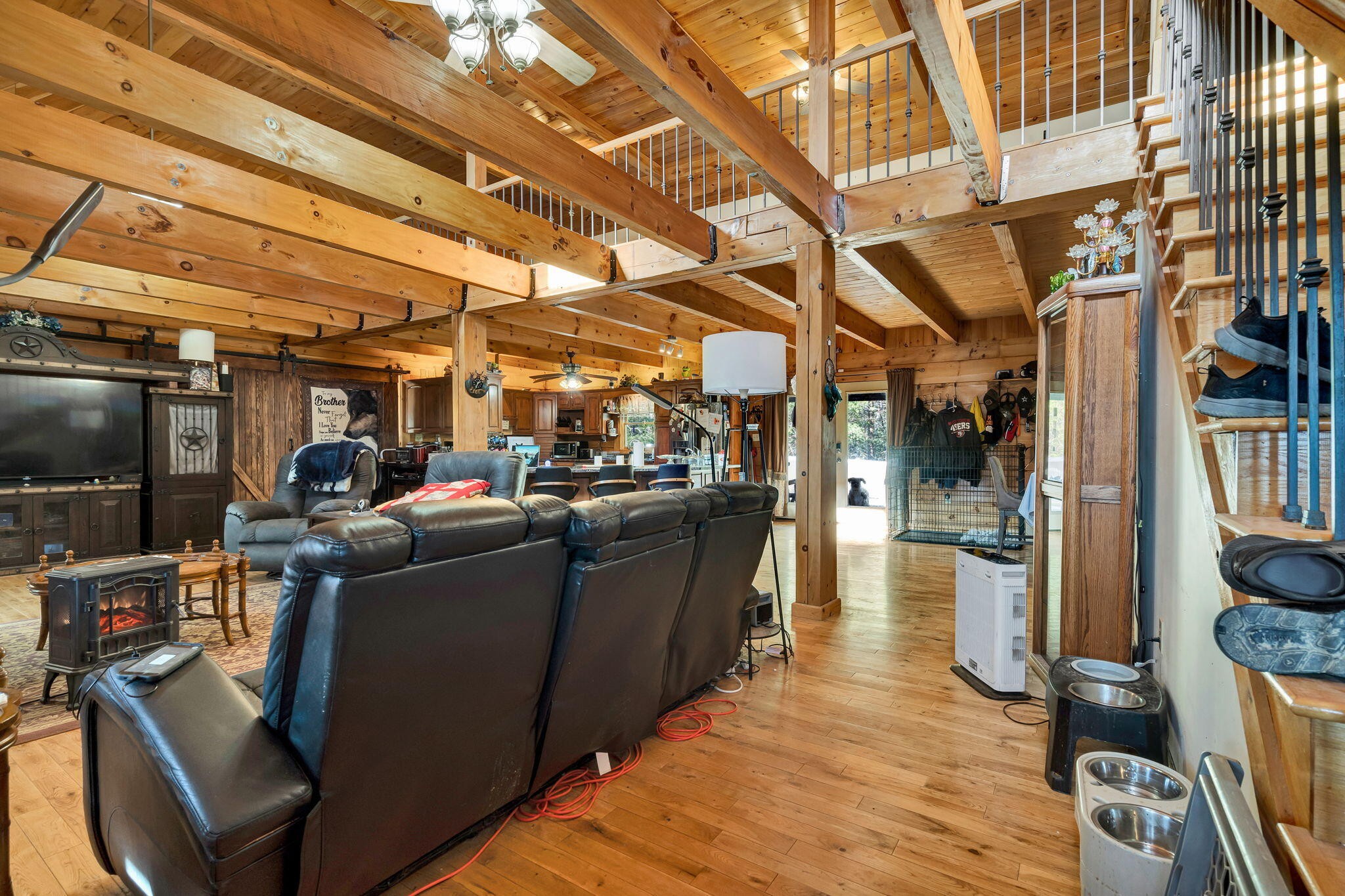 180 McJunkin Road Tellico Plains, TN 37385 - Photo 21 of 60 a living room with furniture and a flat screen tv