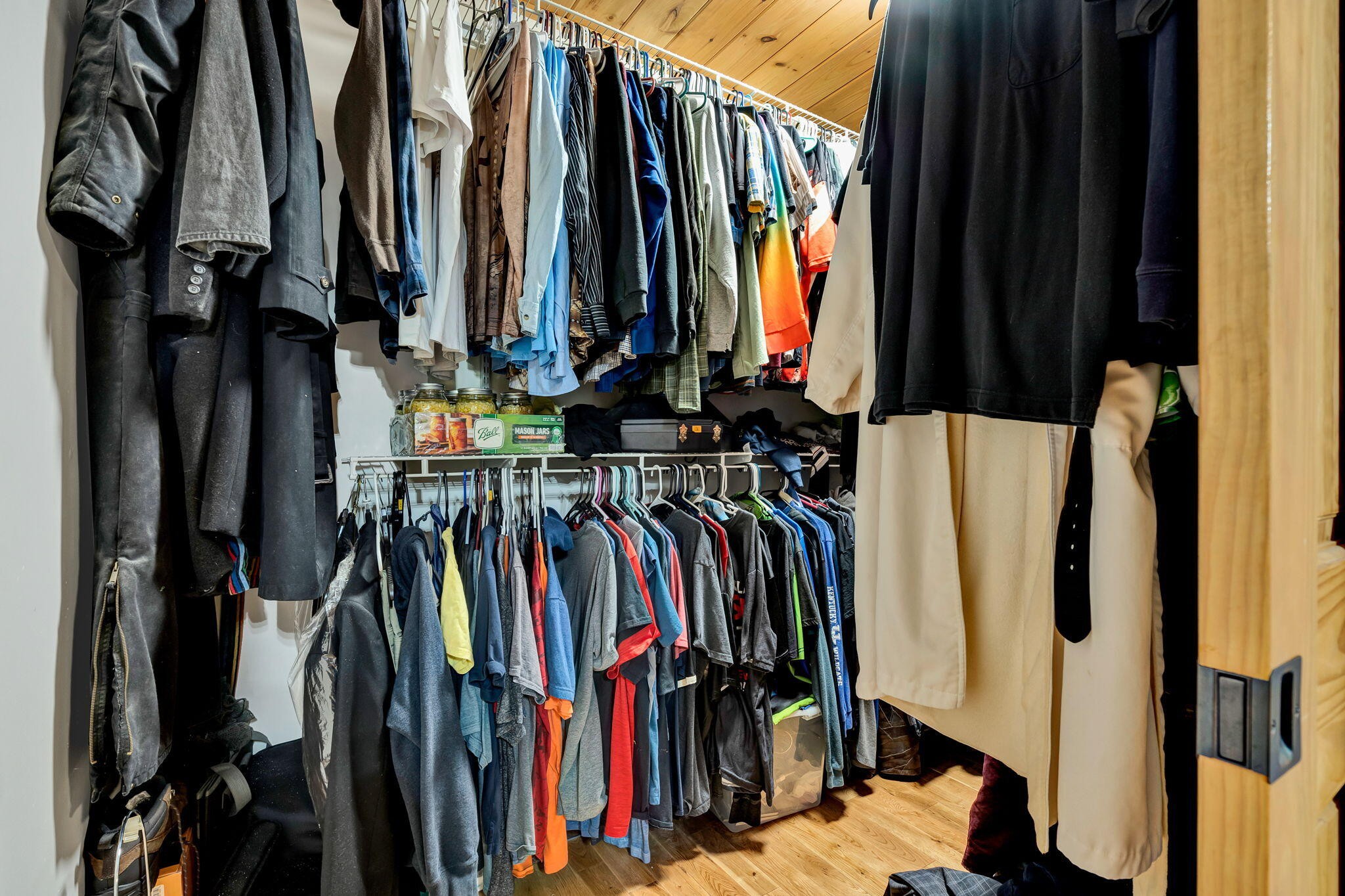 180 McJunkin Road Tellico Plains, TN 37385 - Photo 32 of 60 a view of walk in closet with clothes