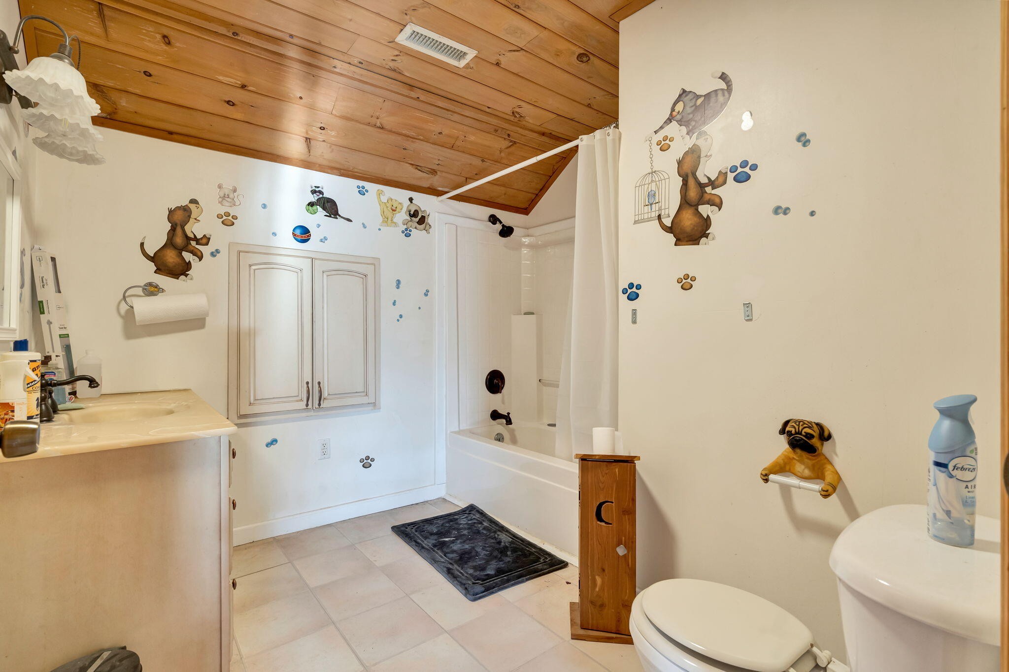 180 McJunkin Road Tellico Plains, TN 37385 - Photo 36 of 60 a bathroom with a sink toilet and shower
