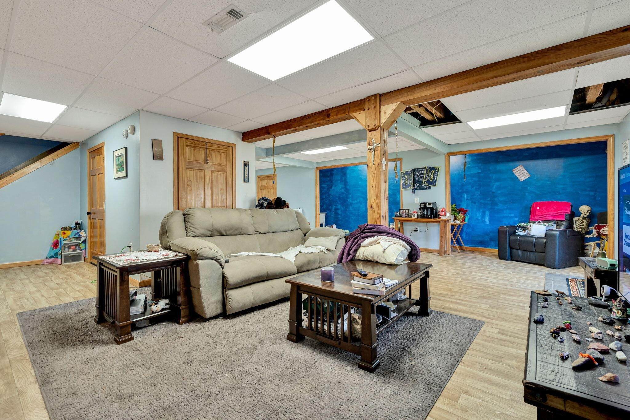 180 McJunkin Road Tellico Plains, TN 37385 - Photo 41 of 60 a living room with furniture a window and a chandelier