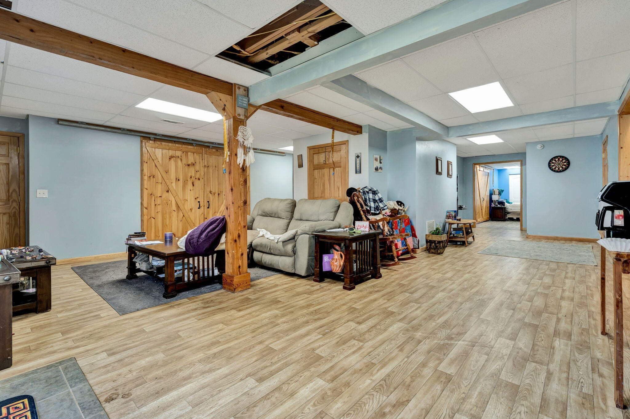 180 McJunkin Road Tellico Plains, TN 37385 - Photo 42 of 60 a living room with furniture and a large window