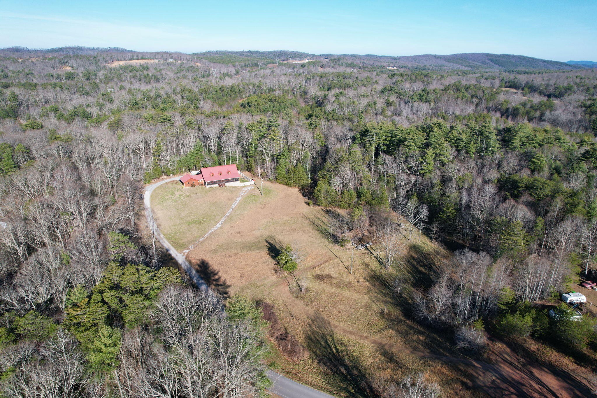 180 McJunkin Road Tellico Plains, TN 37385 - Photo 5 of 60 an aerial view of a house with a yard