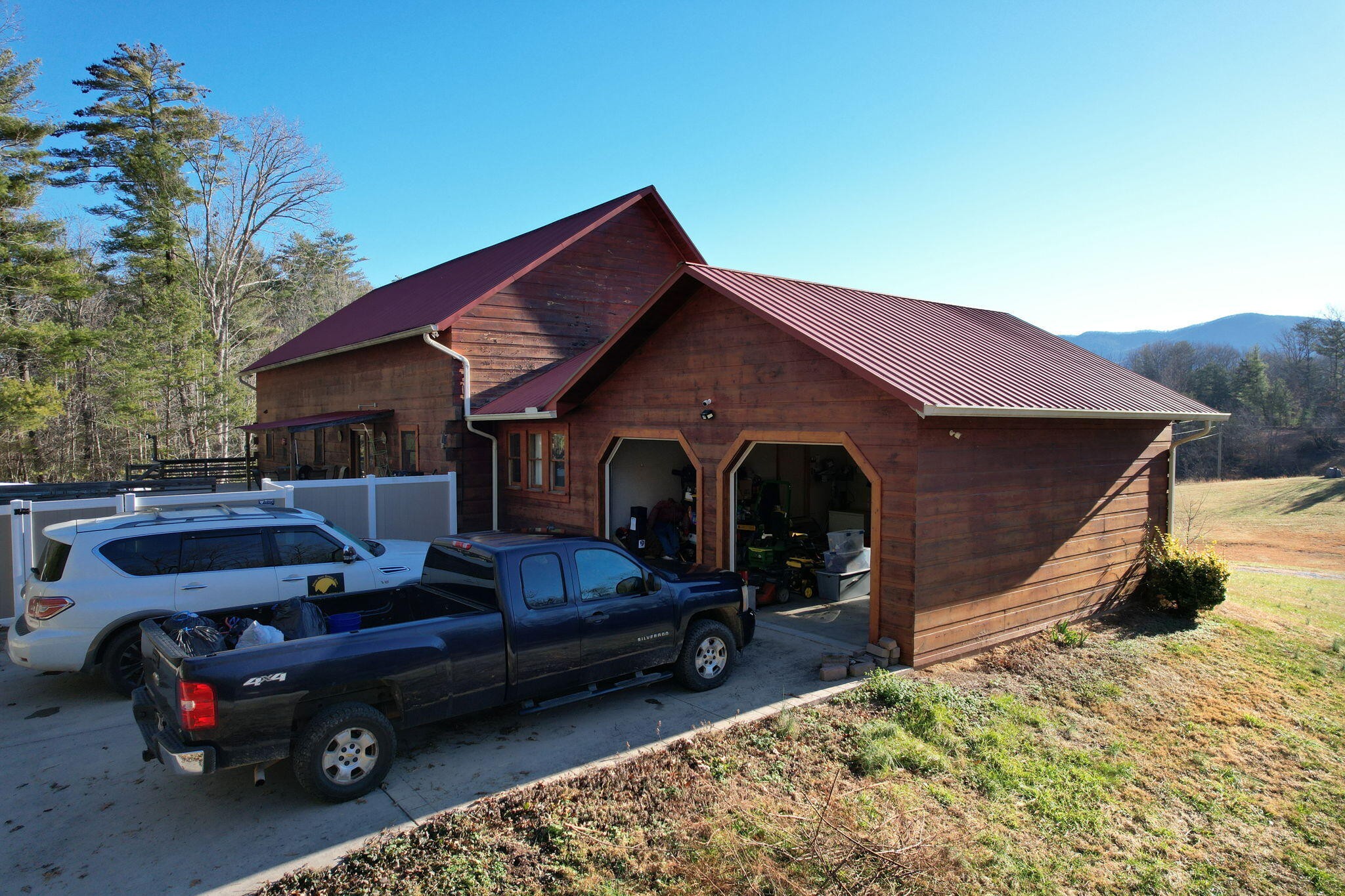 180 McJunkin Road Tellico Plains, TN 37385 - Photo 7 of 60 a front view of a house with a yard