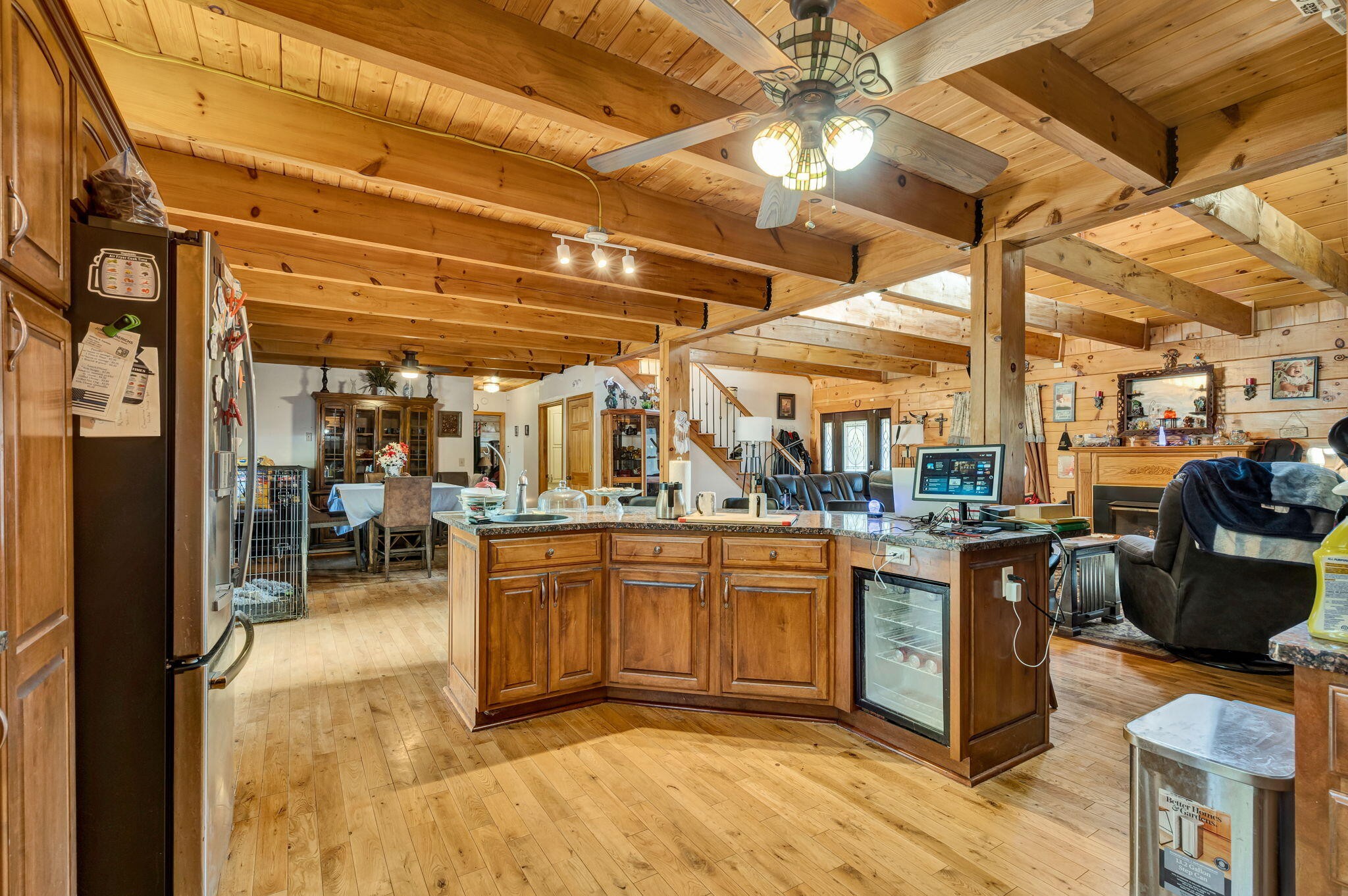 180 McJunkin Road Tellico Plains, TN 37385 - Photo 10 of 60 a kitchen with stainless steel appliances granite countertop a stove a sink and a microwave