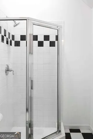 a bathroom with a sink and mirror
