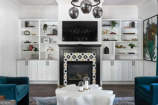 a bed sitting in a bedroom and mirror