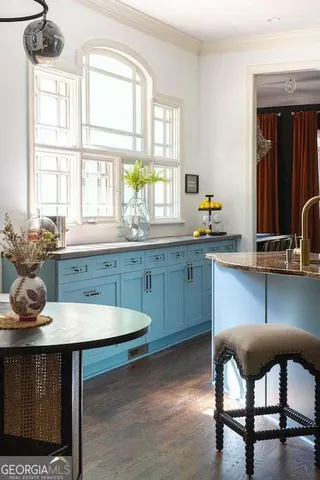 a vase of flowers sitting on a table