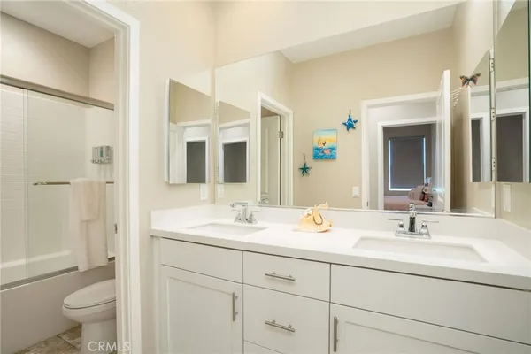a bathroom with a shower and a toilet