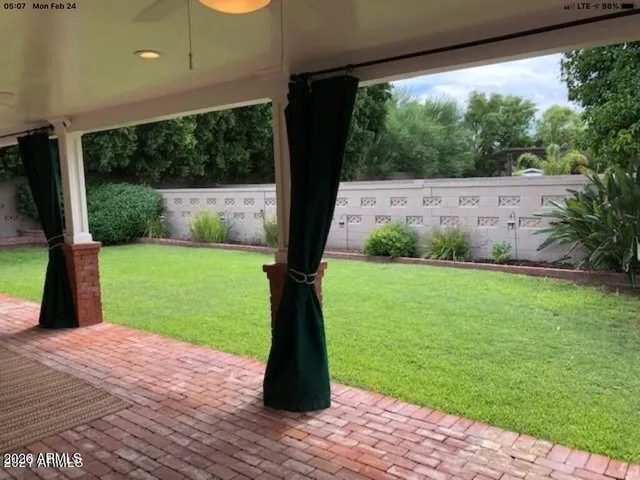 a view of a garden with a slide