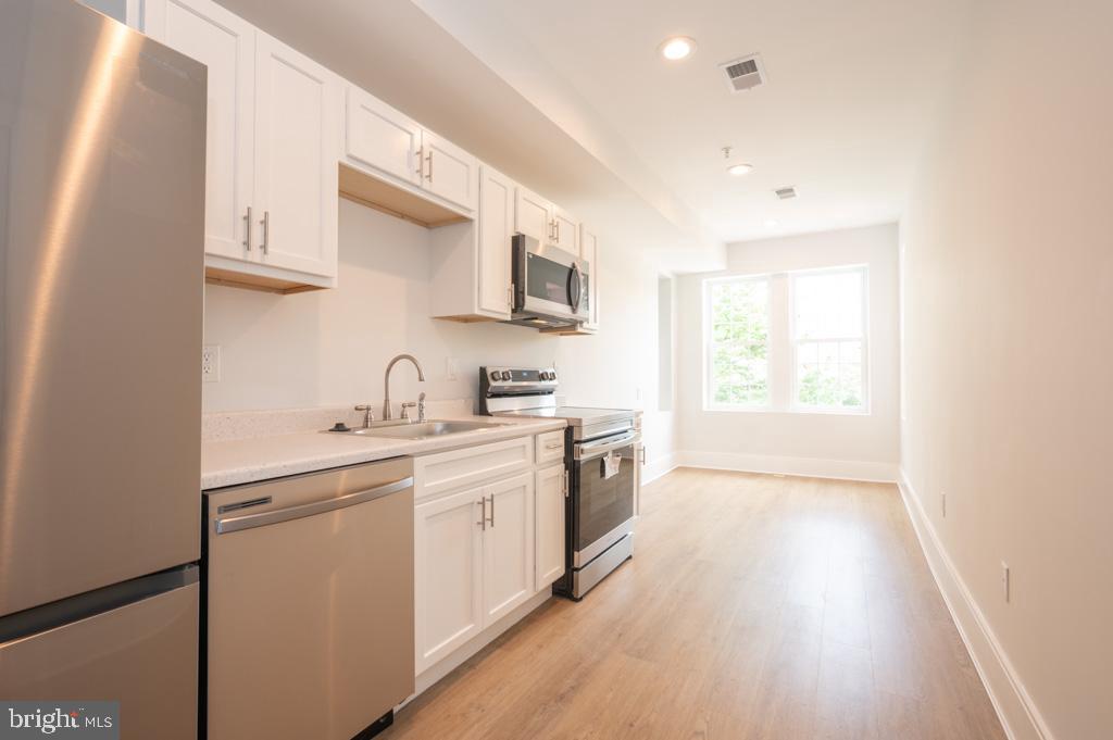 3321 11th Street Northwest, Unit 3 Washington, DC 20010 - Photo 1 of 9 Kitchen/living area