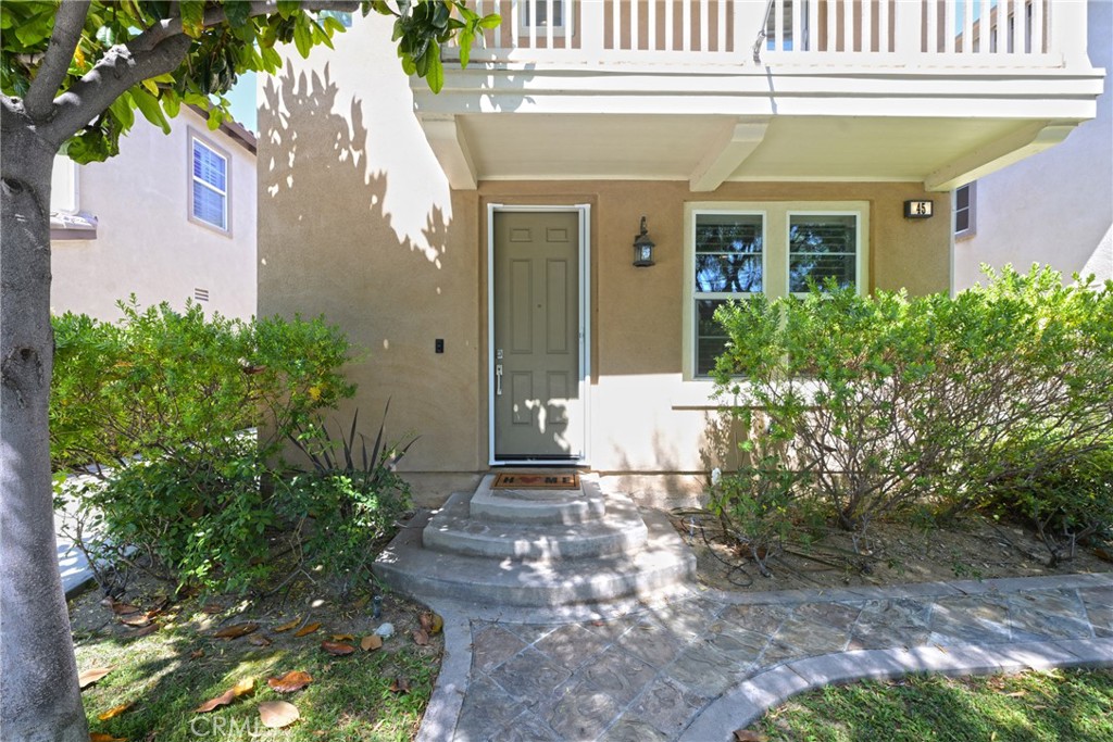 45 Coriander Irvine, CA 92603 - Photo 18 of 64 a front view of a house with plants