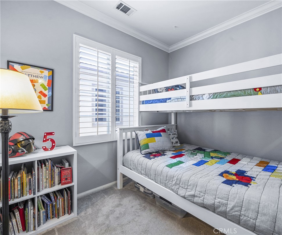 45 Coriander Irvine, CA 92603 - Photo 22 of 64 a bedroom with a bed and a window