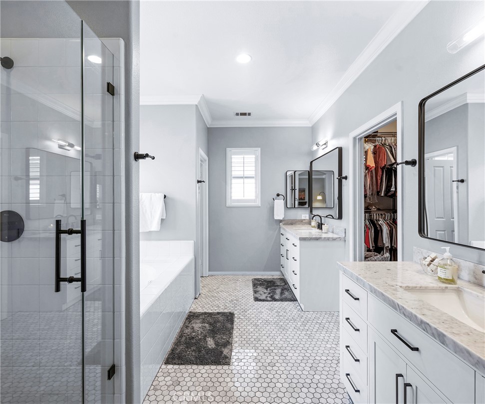 45 Coriander Irvine, CA 92603 - Photo 27 of 64 a bathroom with a sink a toilet and shower