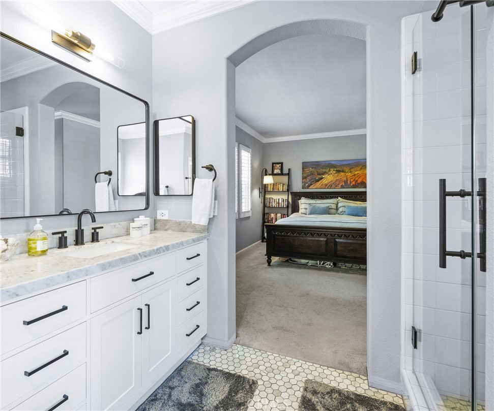 45 Coriander Irvine, CA 92603 - Photo 29 of 64 a en suite bathroom with double sink and a mirror