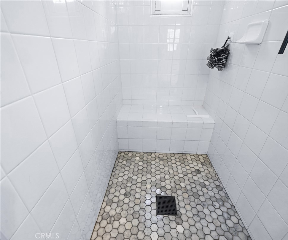 45 Coriander Irvine, CA 92603 - Photo 30 of 64 a bathroom with a shower