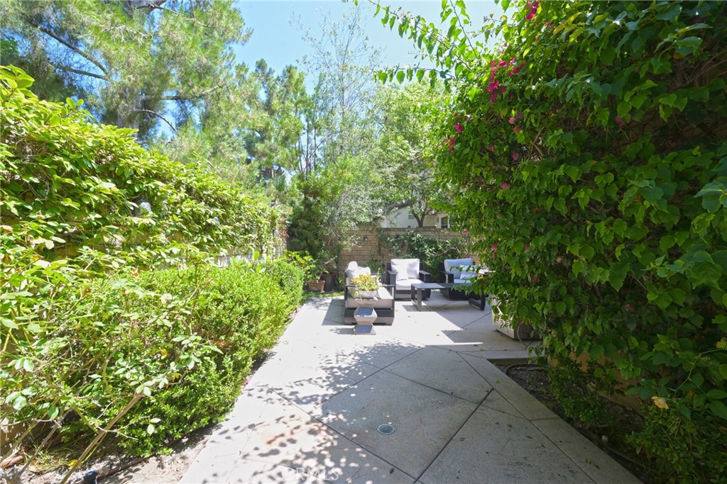 45 Coriander Irvine, CA 92603 - Photo 46 of 64 a view of a bench in a garden