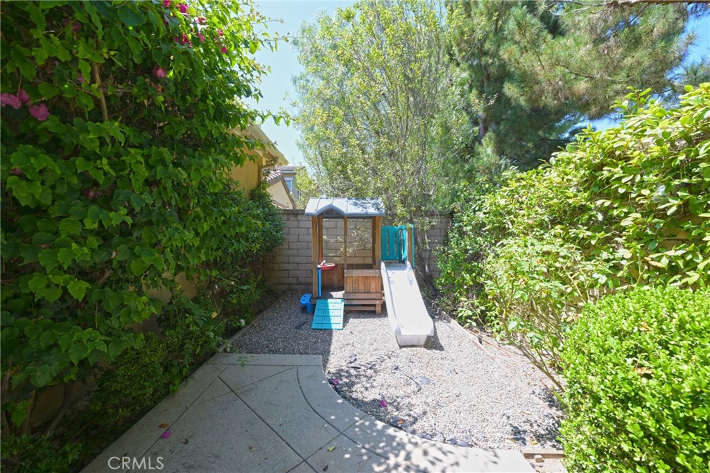 45 Coriander Irvine, CA 92603 - Photo 47 of 64 a front view of a house with a yard
